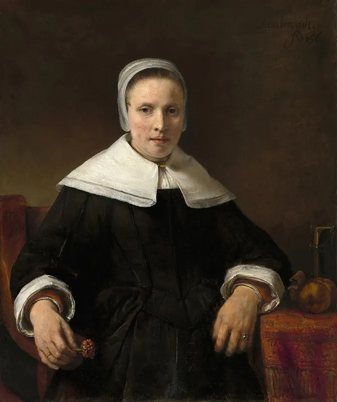 A Woman Holding A Pink Wall Art by Rembrandt van Rijn - High-Resolution Digital Print