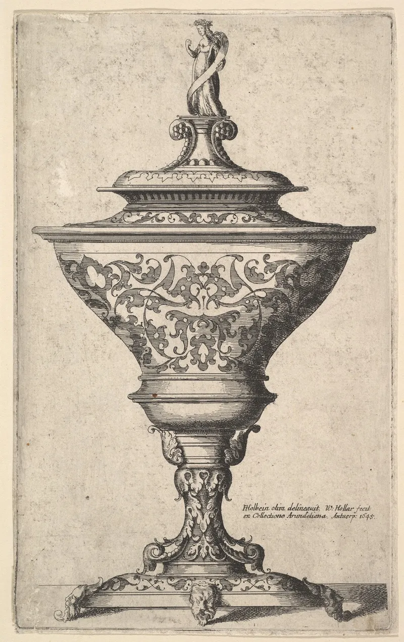 Ornate Goblet On Feet Of Masks