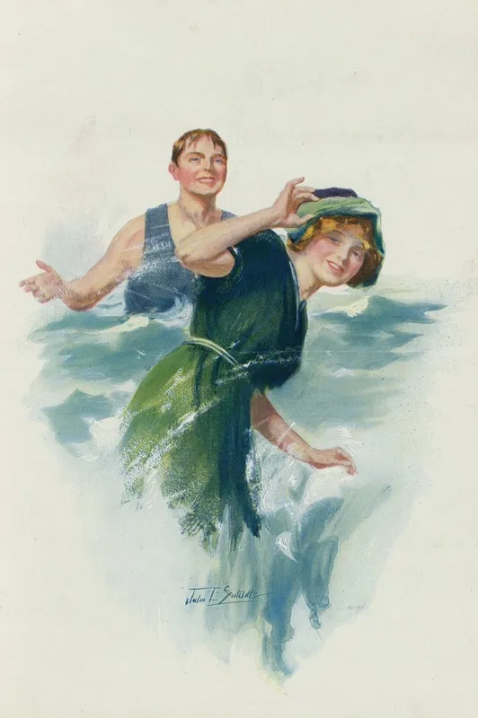 Young Man Splashing A Young Woman With Water At The Beach Wall Art by John E. Sutcliffe - High-Resolution Digital Print