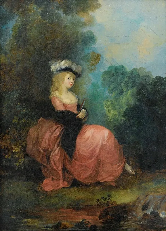 Young Woman Seated In A Park