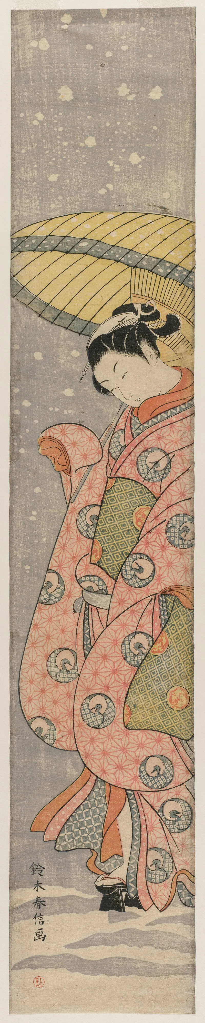 Young Woman Standing Under An Umbrella In The Snow