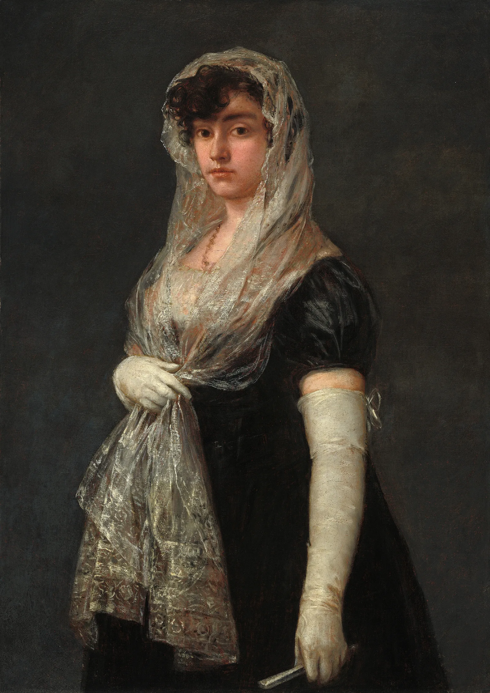 Young Lady Wearing A Mantilla And Basquina Wall Art by Francisco de Goya - Canvas Print