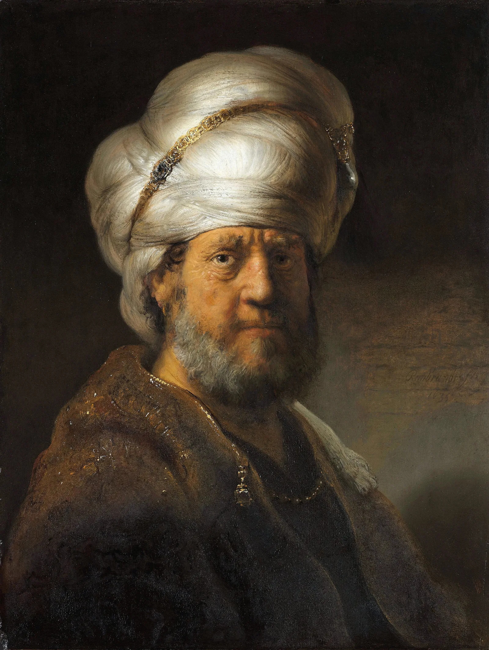 Man In Oriental Clothing Wall Art by Rembrandt van Rijn - Canvas Print