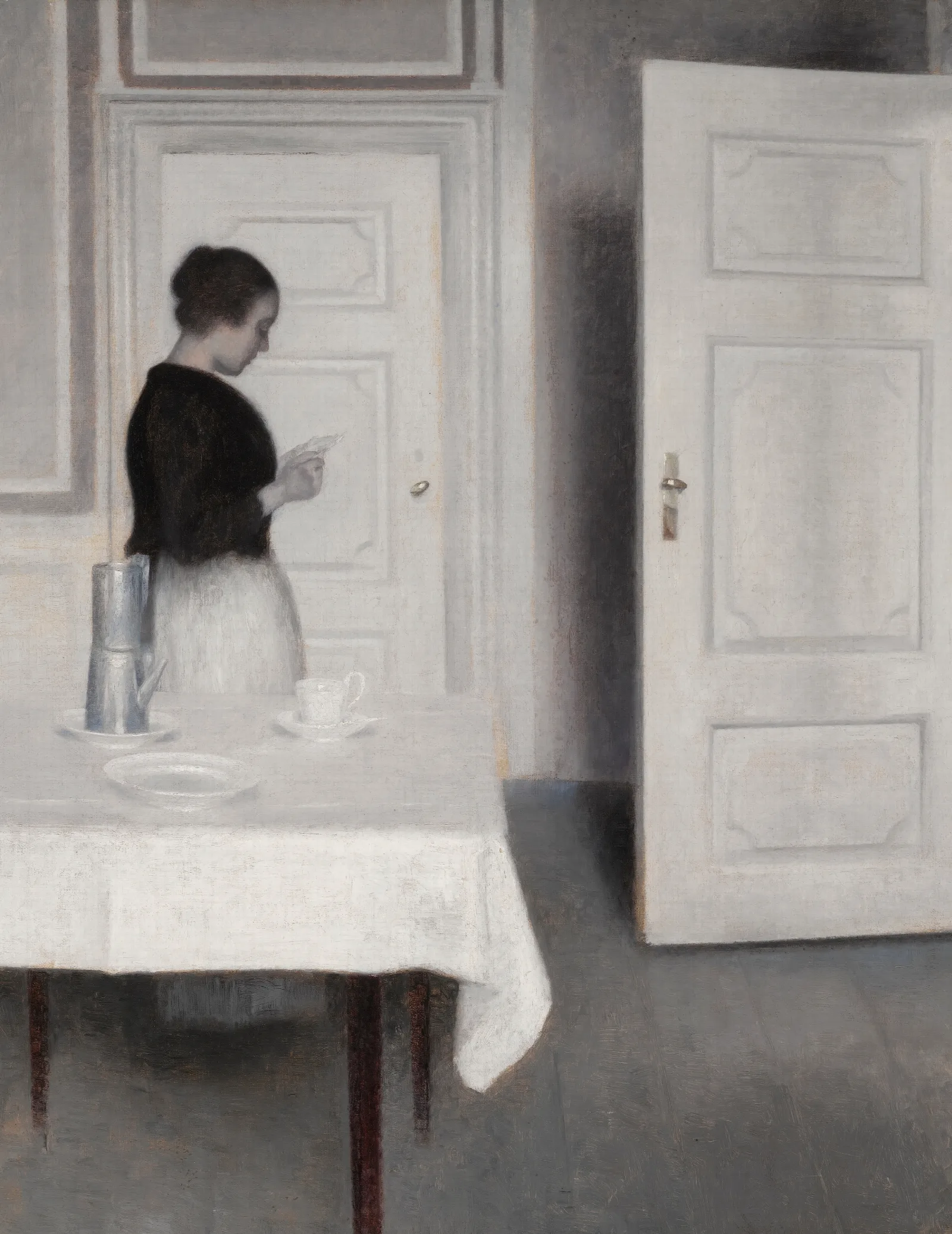 Ida Reading A Letter Wall Art by Vilhelm Hammershøi - Canvas Print