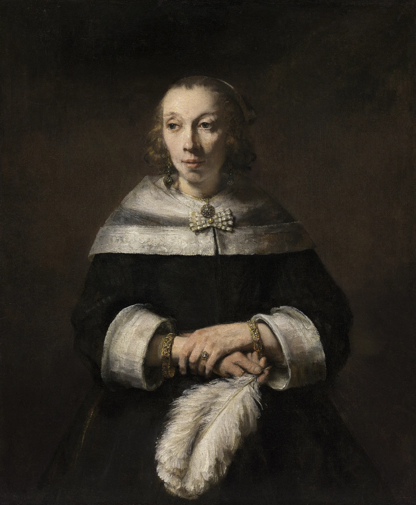 Portrait Of A Lady With An Ostrich Feather Fan Wall Art by Rembrandt van Rijn - Canvas Print