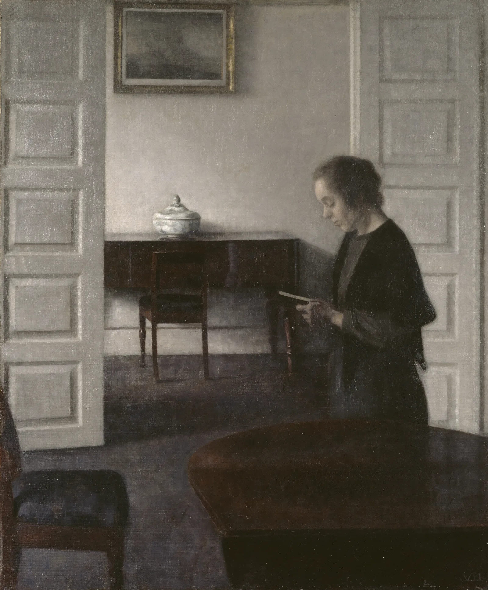 Interior With A Reading Lady Wall Art by Vilhelm Hammershøi - Canvas Print