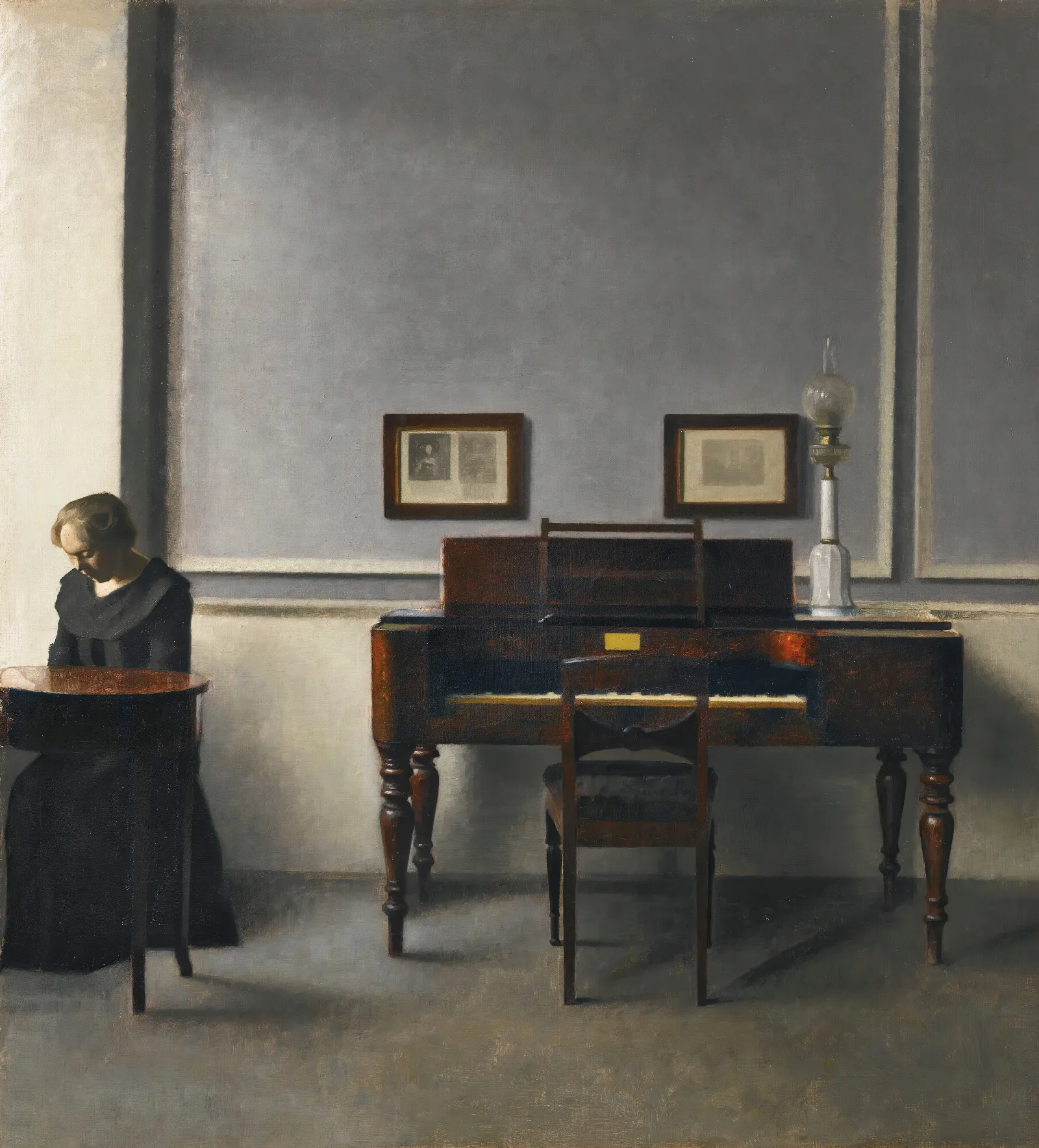 Ida In An Interior With Piano Wall Art by Vilhelm Hammershøi - Canvas Print