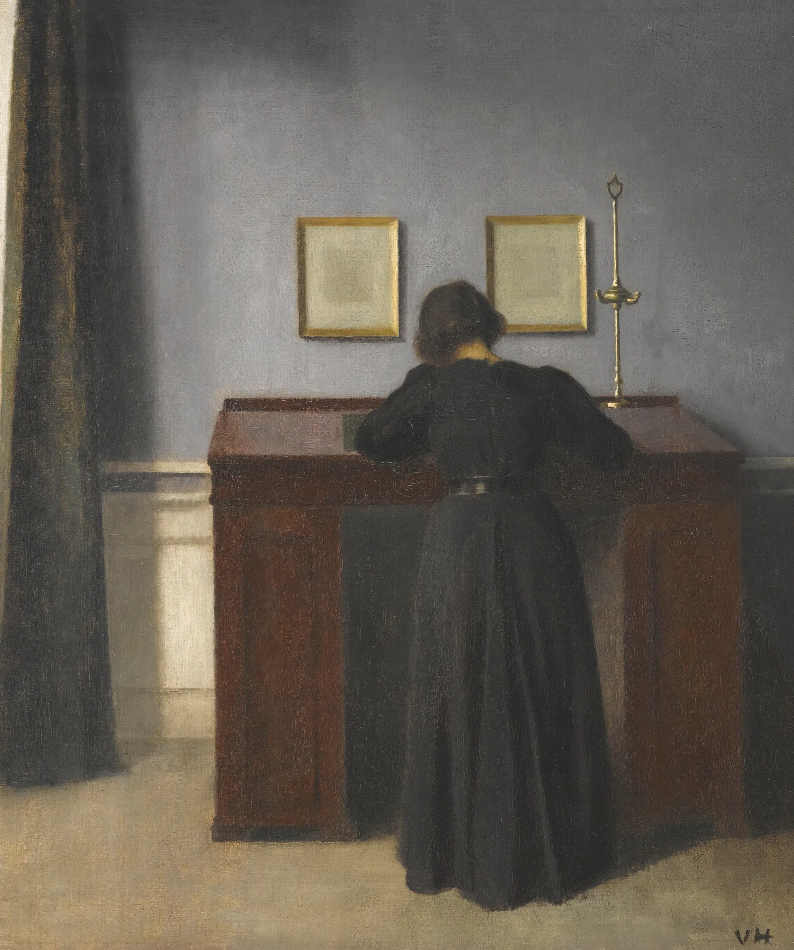 Ida Standing At A Desk Wall Art by Vilhelm Hammershøi - Canvas Print