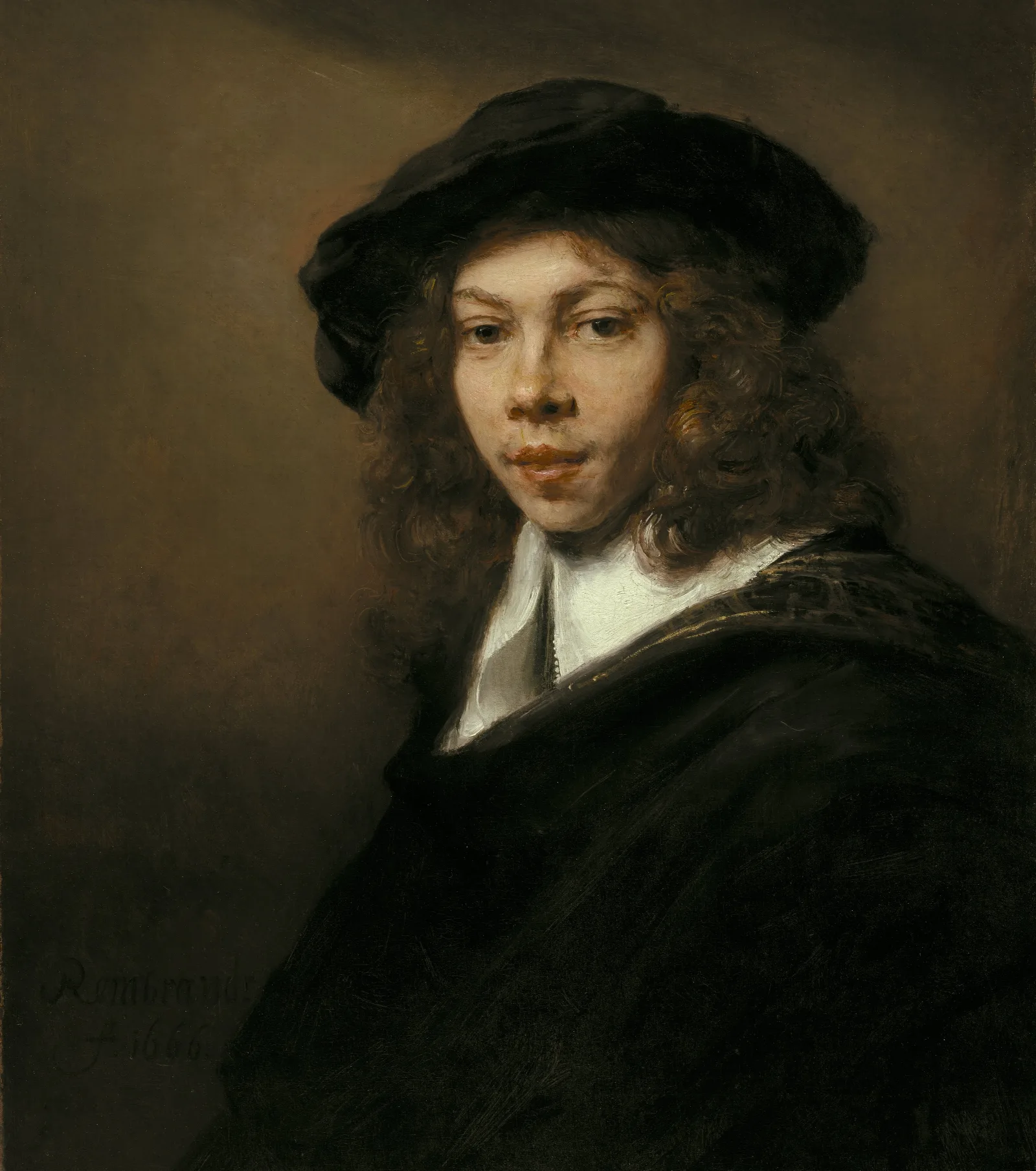 Young Man In A Black Beret Wall Art by Rembrandt van Rijn - Canvas Print