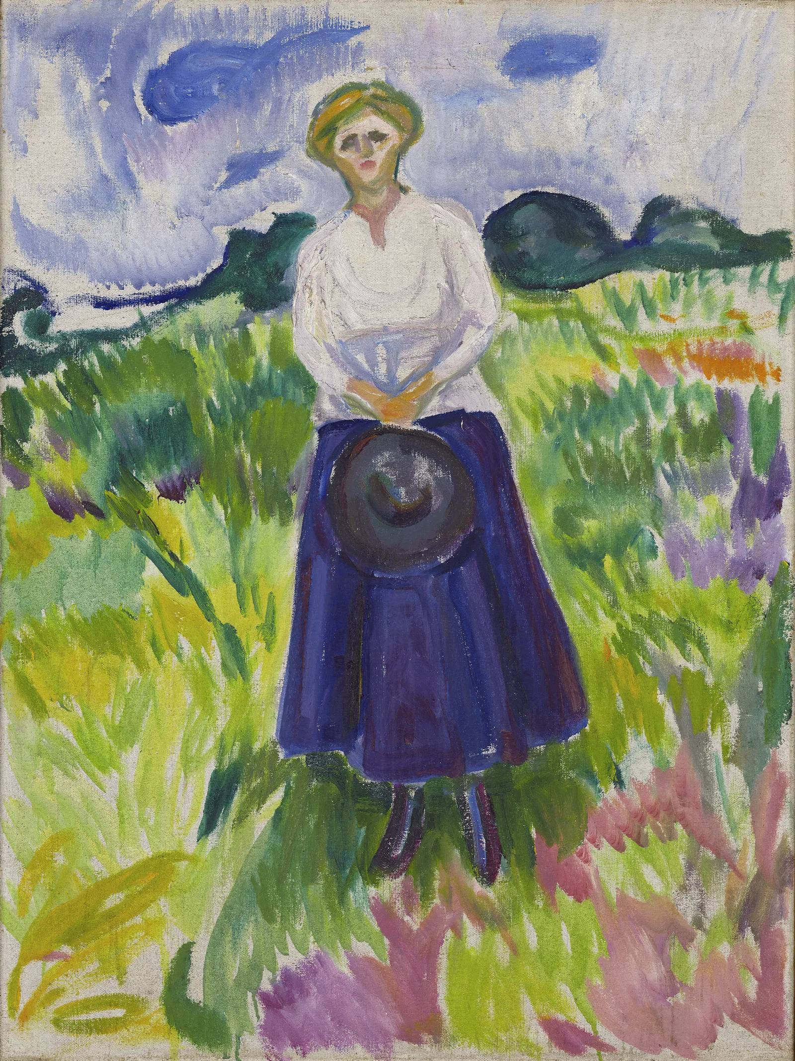 Woman In A Green Meadow Wall Art by Edvard Munch - Canvas Print