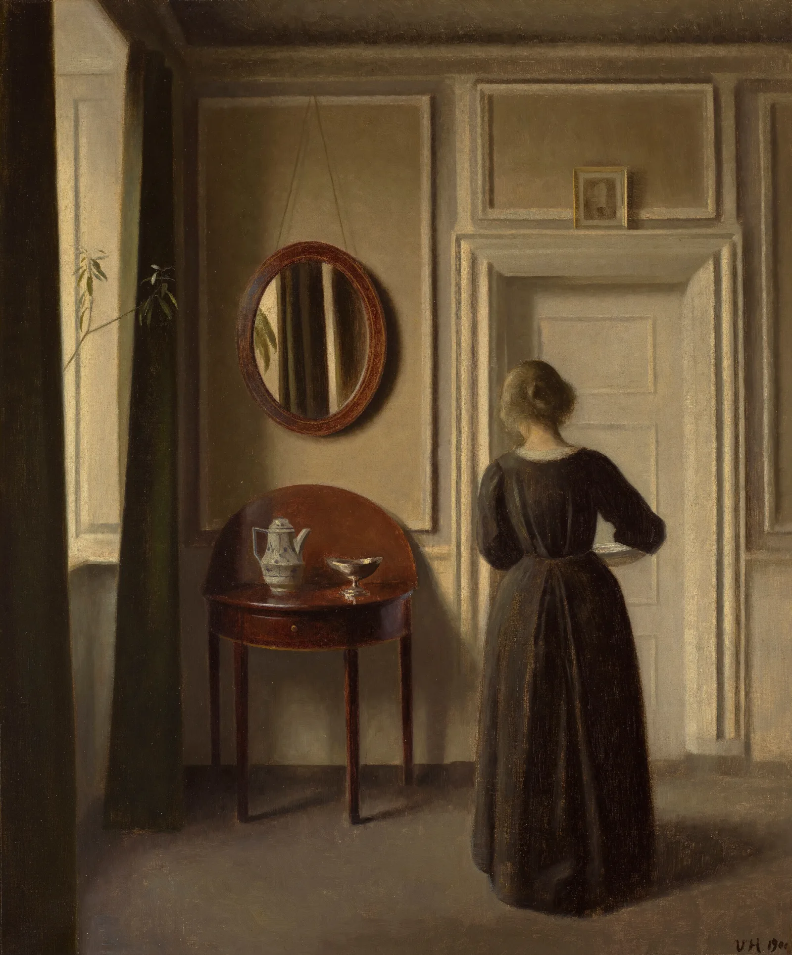 Stue Interior With An Oval Mirror Wall Art by Vilhelm Hammershøi - Canvas Print