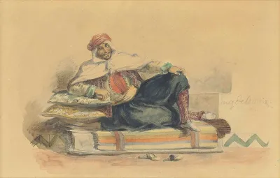 A Berber Seated On A Low Couch