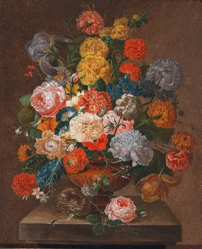 A Bouquet Of Flowers With A Birds Nest