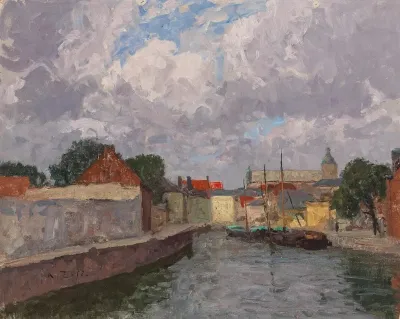 A Canal With Boats Before A Town