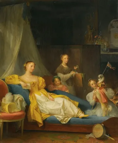 A Family In An Interior Playing With A Dog