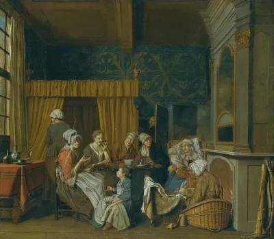 A Family Taking Tea While Celebrating The Birth Of Twins