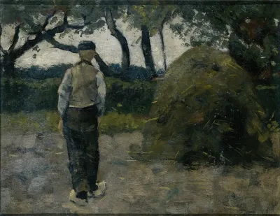 A Farmer Standing Near A Hay Stack