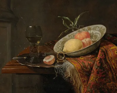 A Lemon Orange And Nectarine In A Porcelain Bowl