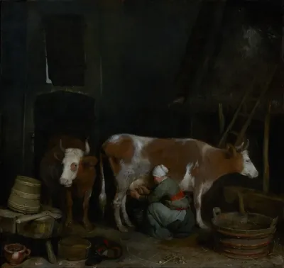 A Maid Milking A Cow In A Barn