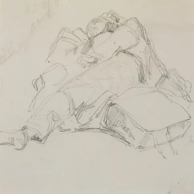 A Man Asleep On A Pile Of Luggage
