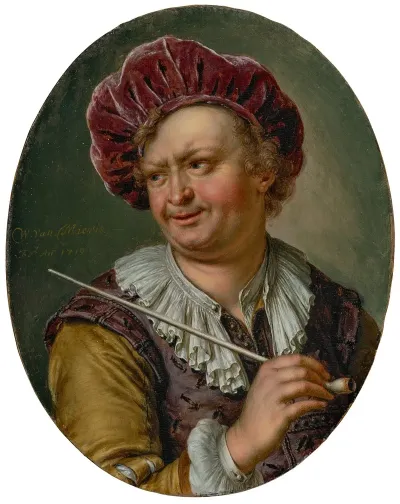 A Man Holding A Pipe