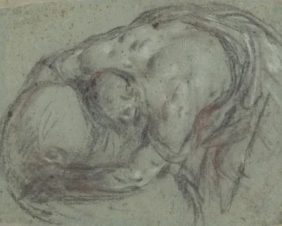 A Man Lifting A Bundle