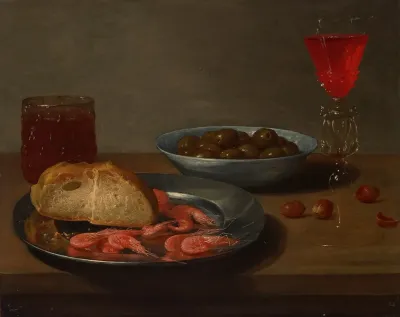 A Plate With Prawns And A Roll A Bowl With Olives A Facon De Venise A Glass Of Beer And Almonds On A Table