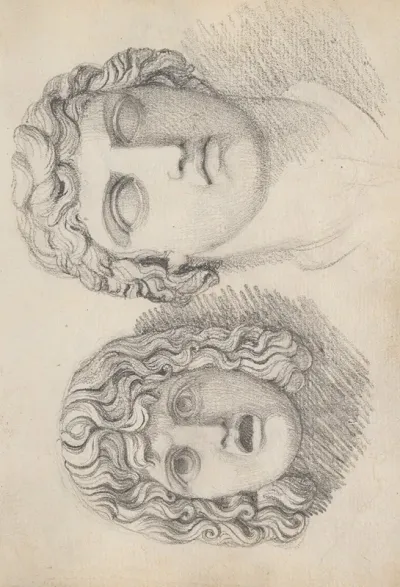 A Roman Tragic Mask And A Male Head