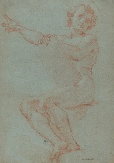 A Seated Man Holding A Tablet