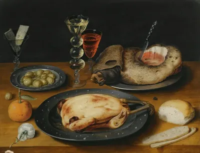 A Still Life Of A Roast Chicken A Ham And Olives On Pewter Plates With A Bread Roll An Orange Wineglasses And A Rose On A Wooden Table