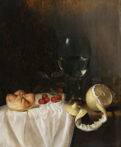A Still Life With A Roemer A Peeled Lemon Cherries And A Bread Roll On A Partly Draped Table