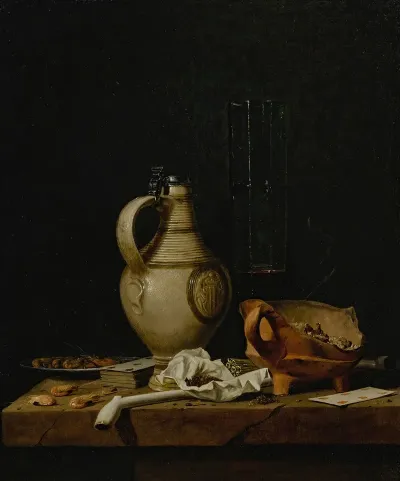 A Still Life With A Stoneware Jug A Glass Of Beer Playing Cards And Smokers Requisites