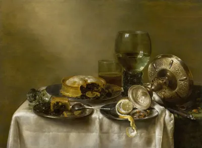 A Still Life With An Overturned Silver Tazza Glassware Pies And A Peeled Lemon On A Table
