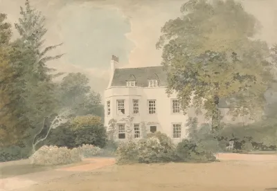 A White House In A Garden Setting