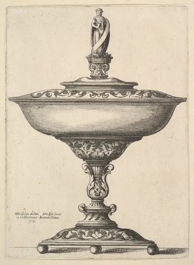 A Wide Cup With Ball Feet