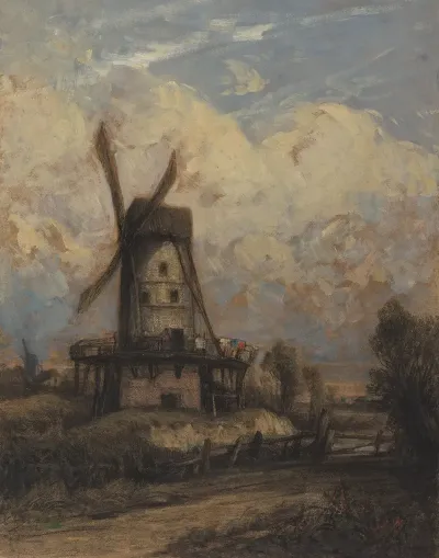 A Windmill Against A Cloudy Sky