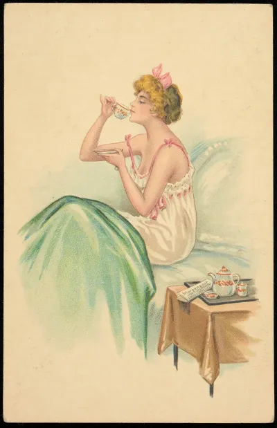 A Woman In A Negligee Drinks Her Morning Coffee In Bed