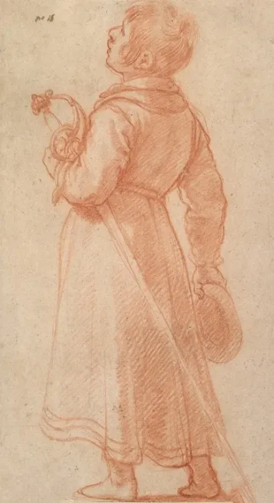 A Young Boy Seen From Behind Holding A Sword And Cap