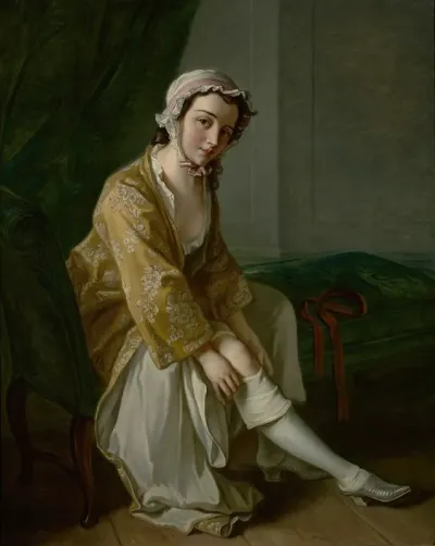 A Young Woman Pulling On Her Stocking