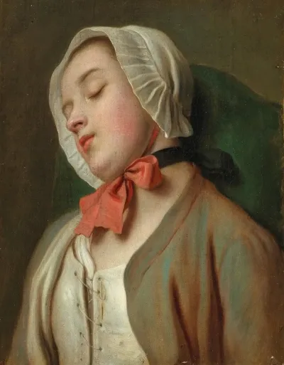 A Young Woman Sleeping In A Chair
