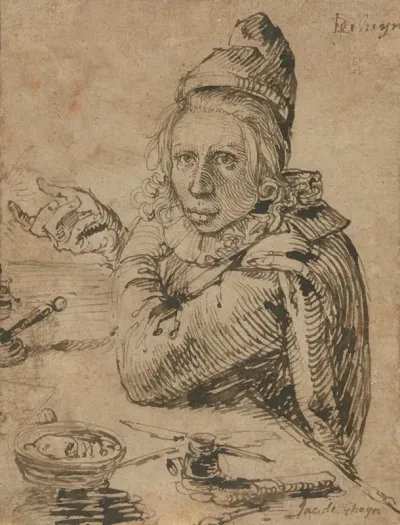 A Youth Seated At A Table
