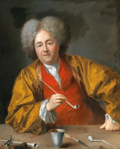 An Elegant Gentleman Holding A Pipe