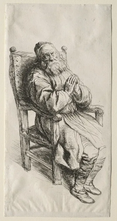 An Old Man In A Chair Praying