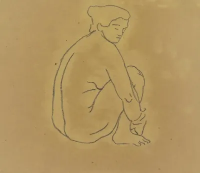 Auf Dem Boden Hockende Frau