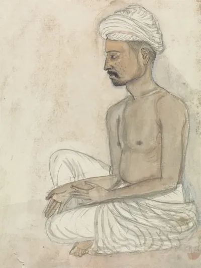 Barechested Man Sitting Crosslegged