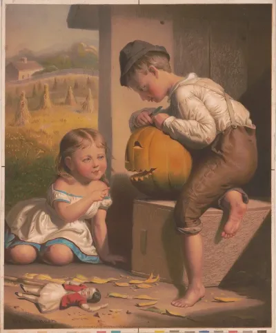 Boy And Girl Carving Pumpin Into Jack Olantern