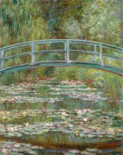 Bridge Over A Pond Of Water Lilies