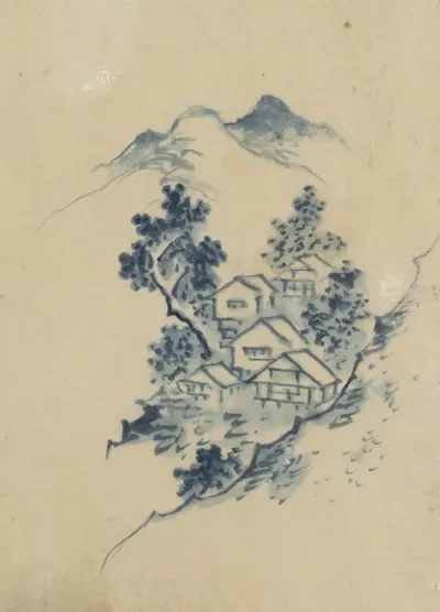 Buildings Nestled Among Trees In A Mountain Valley