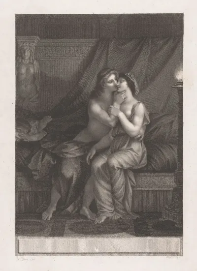 Couple In Love Sitting On Bed