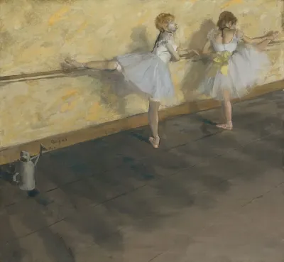 Dancers Practicing At The Barre